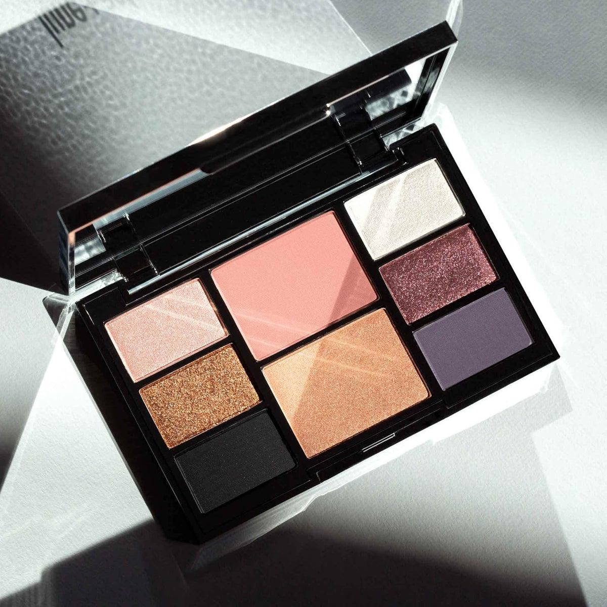 Lune+Aster Double Booked Face & Eye Palette - This online exclusive palette features a mauve blush, bronze highlighter and six show-stopping velvety eyeshadows to create an elevated look for any special occasion.